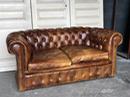 Ancien canapé en cuir chesterfield