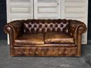 Ancien canapé en cuir chesterfield