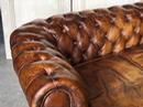 Ancien canapé en cuir chesterfield