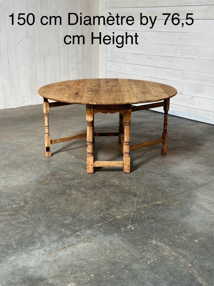 Antique round dining table 