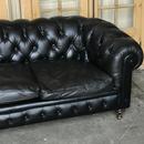 Canapé cuir noir chesterfield