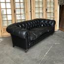 Canapé cuir noir chesterfield