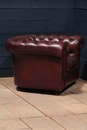 Fauteuil cuir chesterfield