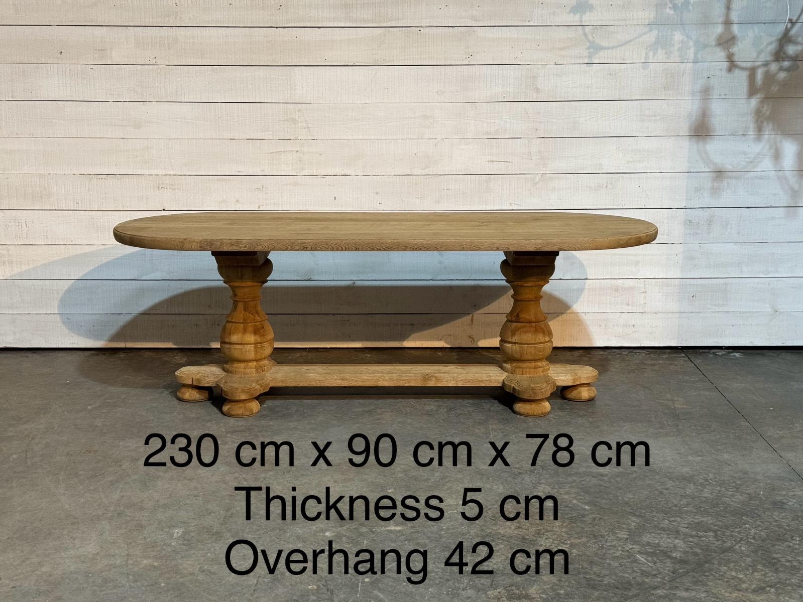 Large oval oak trestle table 