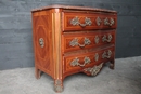 Louis VIII style Marble top chest of drawer in rich bronzes and copper inlaid