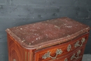 Louis VIII style Marble top chest of drawer in rich bronzes and copper inlaid