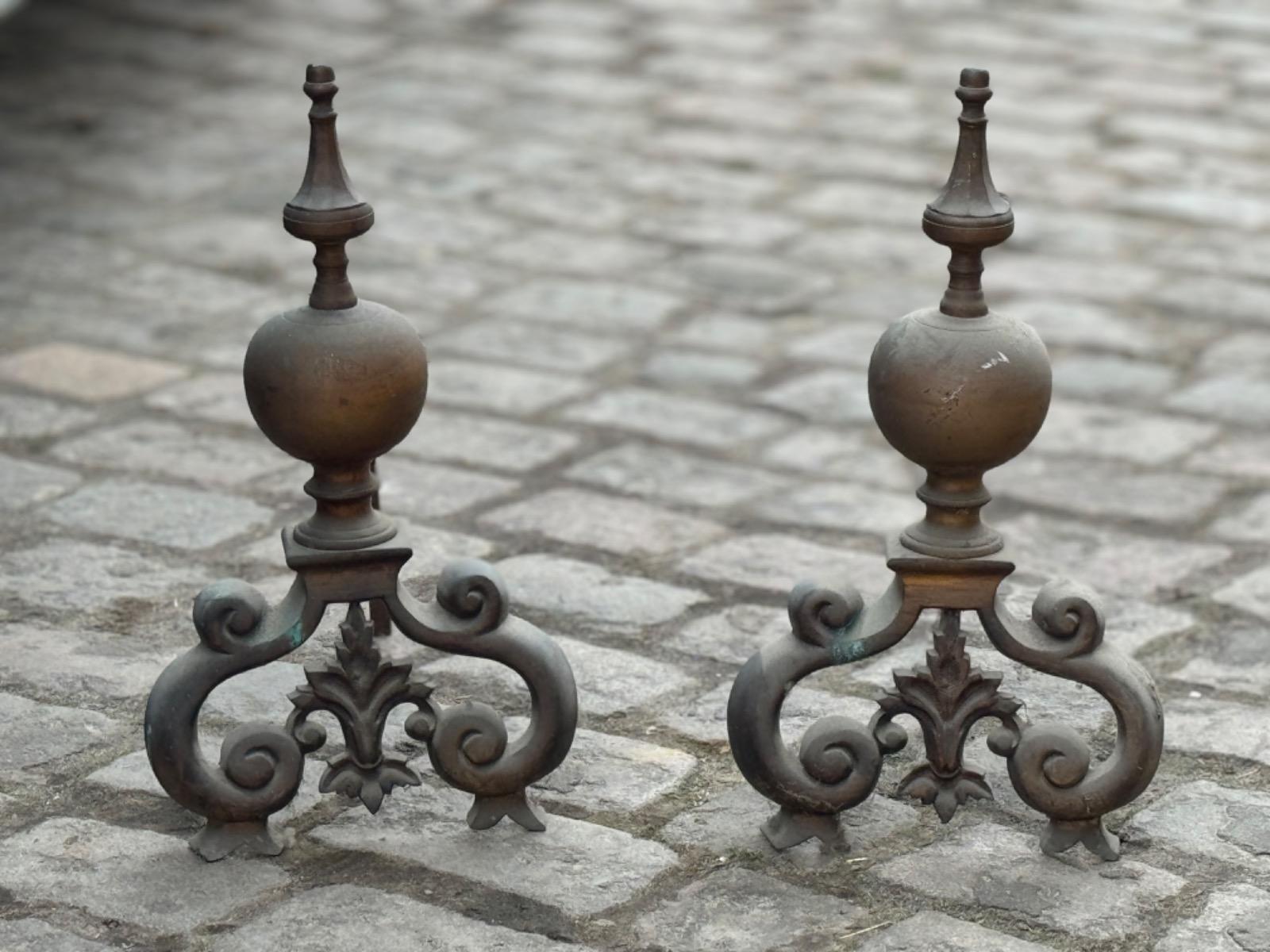 Pair of antique brass renaissance fire dogs 