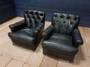 style Pair of black leather armchairs