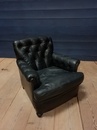 style Pair of black leather armchairs