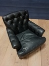 style Pair of black leather armchairs