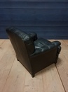 style Pair of black leather armchairs