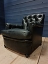 style Pair of black leather armchairs