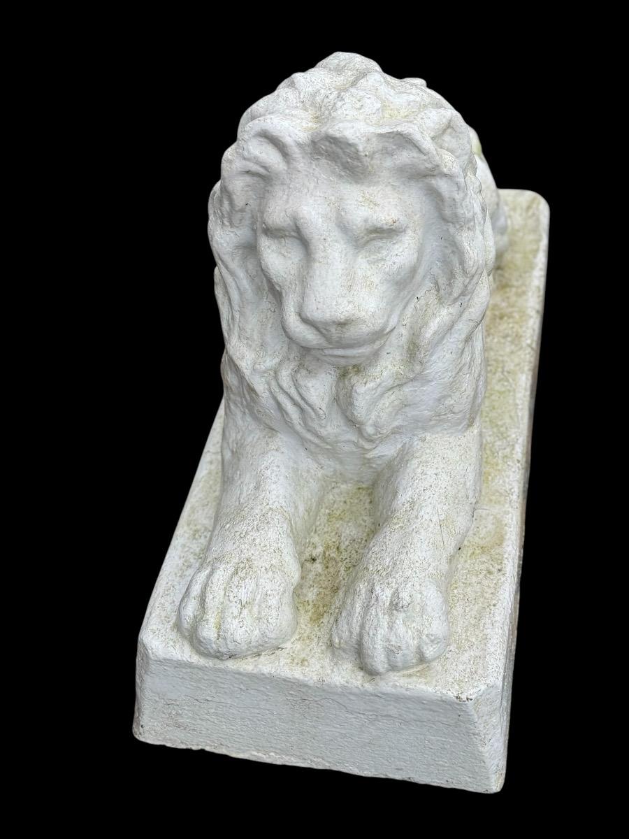 pair of concrete lions 