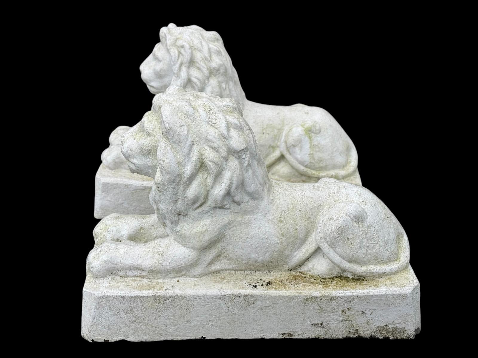 pair of concrete lions 