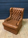 style Pair of leather chesterfield fauteuil