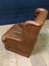 style Pair of leather chesterfield fauteuil