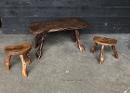 Vintage trunk coffee table with matching tabourets