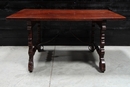 style Walnut spanish table with wrought iron stretcher